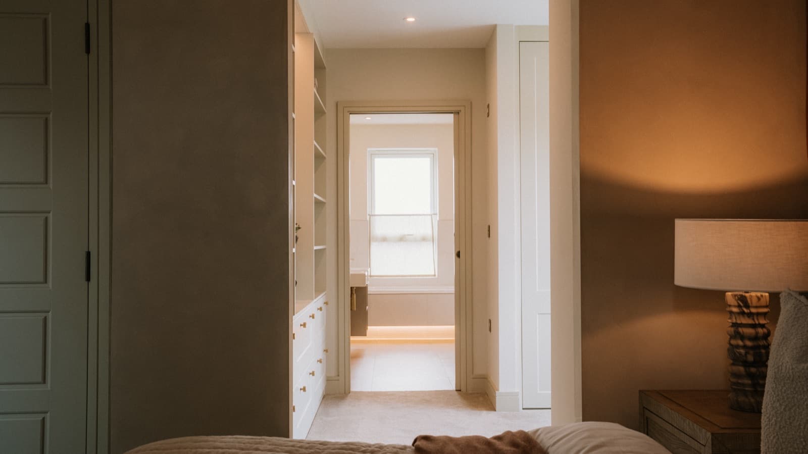 Bright hallway and fitted wardrobes in a new build home